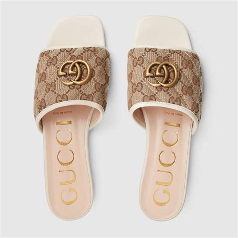 gucci sandals logo|Gucci slippers women.